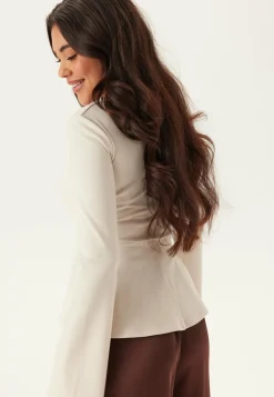 Long Sleeve Peplum Top