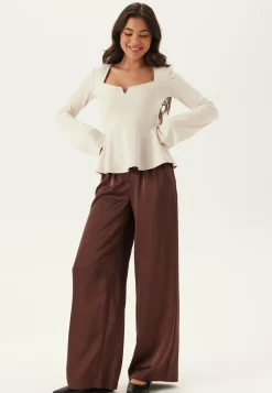 Long Sleeve Peplum Top
