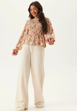 Structure Smock Peplum Top